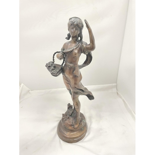 29 - A BRONZE STYLE FIGURE OF A LADY WITH A BASKET HEIGHT 45CM