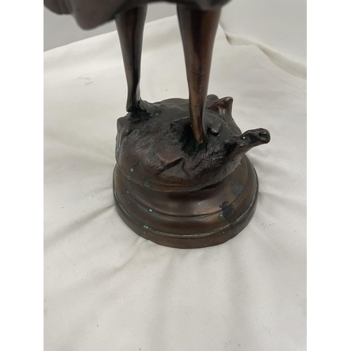 29 - A BRONZE STYLE FIGURE OF A LADY WITH A BASKET HEIGHT 45CM