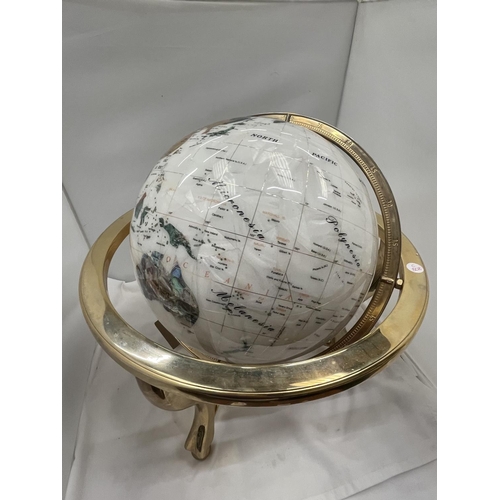 30 - A GLOBE WITH MOTHER OF PEARL INLAYS ON BRASS ROTATING STAND H: 51CM