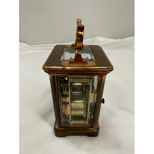 5A - A COPPER CARRIAGE CLOCK WITH BRASS MOVEMENT BY Wm BUFORD AND SON EASTBOURNE AND EXETER WITH TOP ESCA... 