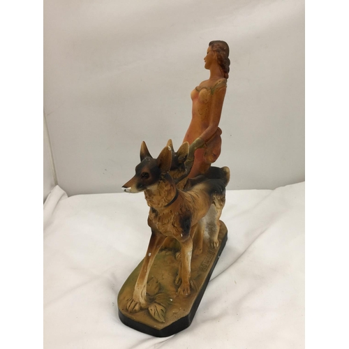 162 - AN EARLY 20TH CENTURY ART DECO STYLE CHALKWARE FIGURE OF A LADY AND TWO GERMAN SHEPHERDS MARKED RD 8... 