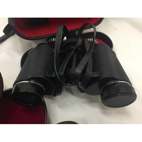 172 - TWO PAIRS OF BINOCULARS IN CASES