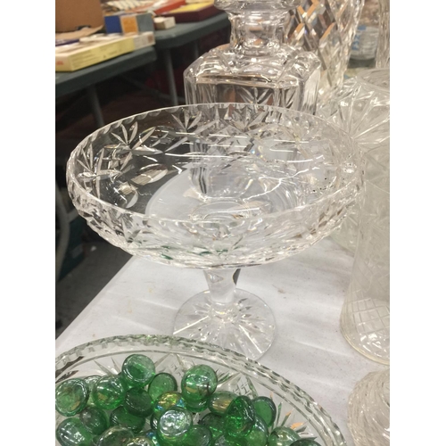 173 - A QUANTITY OF CUT GLASS TO INCLUDE DECANTERS, VASES, BOWLS, ETC PLUS A HALLMARKED BIRMINGHAM SILVER ... 