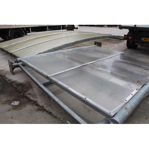 238 - A 10FT X 21FT STEEL FRAMED CAR PORT WITH CORIGATED ROOF AND PLASTIC SIDE PANELS NO VAT