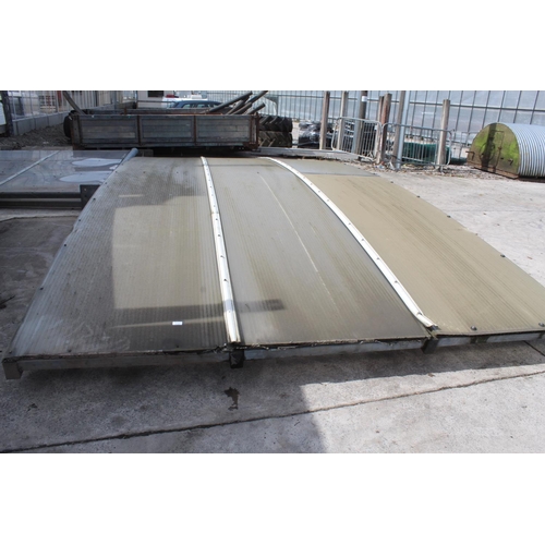 238 - A 10FT X 21FT STEEL FRAMED CAR PORT WITH CORIGATED ROOF AND PLASTIC SIDE PANELS NO VAT