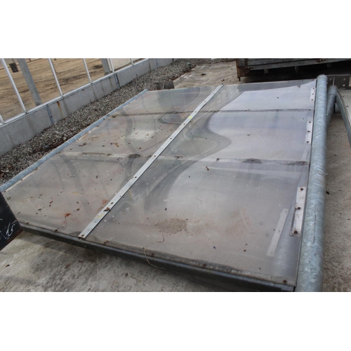 238 - A 10FT X 21FT STEEL FRAMED CAR PORT WITH CORIGATED ROOF AND PLASTIC SIDE PANELS NO VAT