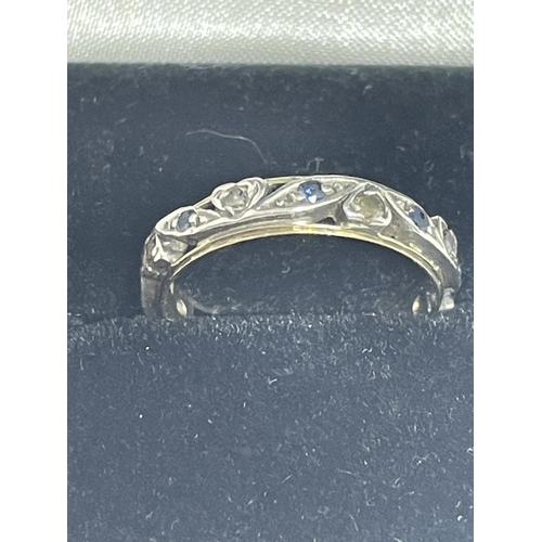 630 - A 9 CARAT WHITE AND YELLOW GOLD RING