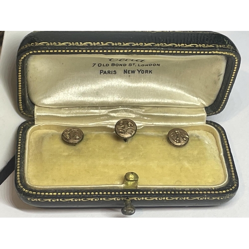 633 - THREE YELLOW METAL COLLAR STUDS IN A PRESENTATION BOX