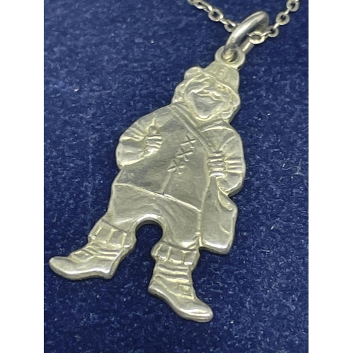 635 - A SILVER NECKLACE WITH A LEPRECHAUN PENDANT IN A PRESENTATION BOX