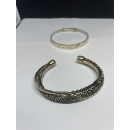 637 - TWO SILVER BANGLES