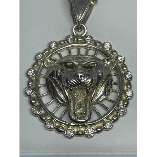 643 - A SILVER LIONS HEAD NECKLACE