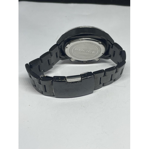 653 - A POLICE WRIST WATCH SEEN WORKING BUT NO WARRANTY