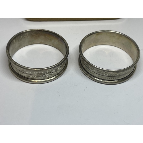 676 - A PAIR OF HALLMARKED SILVER NAPKIN RINGS BY F.I.W & S