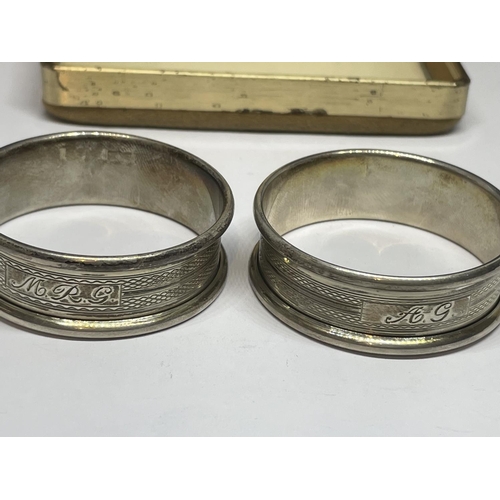 676 - A PAIR OF HALLMARKED SILVER NAPKIN RINGS BY F.I.W & S