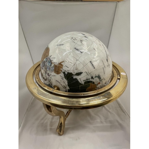 30 - A GLOBE WITH MOTHER OF PEARL INLAYS ON BRASS ROTATING STAND H: 51CM