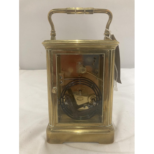 107 - A BRASS JOSEPH PENLINGTON, PARIS, CARRIAGE CLOCK WITH GLASS TO THREE SIDES AND TOP IN WORKING ORDER ... 