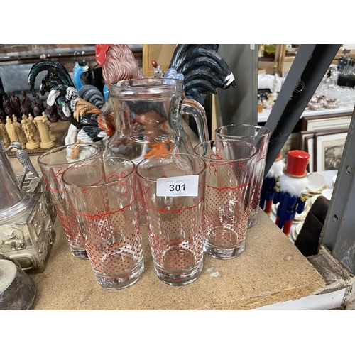 301 - A LEMONADE SET TO INCLUDE A JUG WITH RED DETAIL AND SIX TUMBLERS