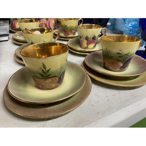 324 - A HAND PAINTED COFFEE SET WITH FRUIT DESIGN AND GILT INNER TO INCLUDE A COFFEE POT, CREAM JUG, SUGAR... 