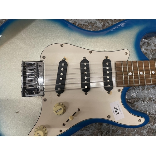 352 - A GROOVE TURQUOISE AND WHITE ELECTRIC GUITAR