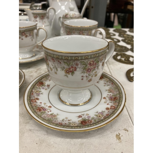 450 - A NORITAKE COFFEE SET TO INCLUDE A COFFEE POT, CREAM JUG, LIDDED SUGAR BOWL FOUR CUPS AND SAUCERS