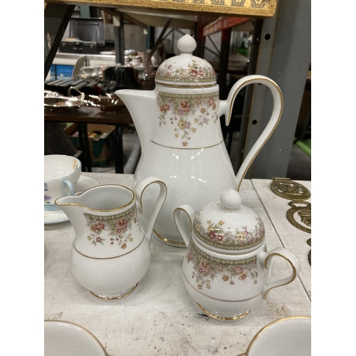 450 - A NORITAKE COFFEE SET TO INCLUDE A COFFEE POT, CREAM JUG, LIDDED SUGAR BOWL FOUR CUPS AND SAUCERS