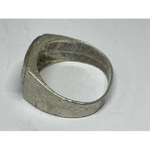 544 - A SILVER ASIAN RING WITH A PRESENTATION BOX