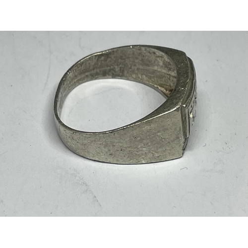 544 - A SILVER ASIAN RING WITH A PRESENTATION BOX