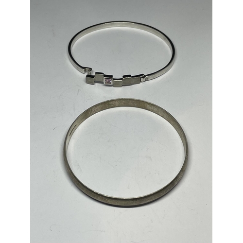 567 - TWO MARKED SILVER BANGLES