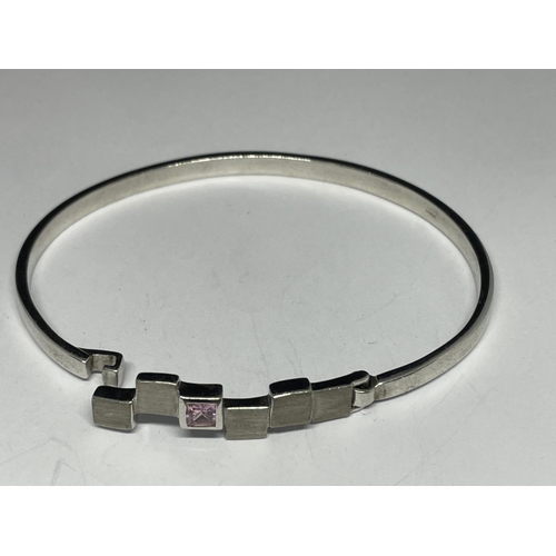 567 - TWO MARKED SILVER BANGLES