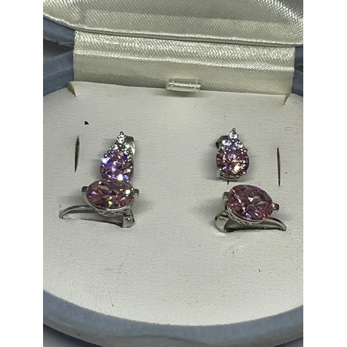 571 - TWO PAIRS OF SILVER AND PINK STONE EARRINGS IN A PRESENTATION BOX