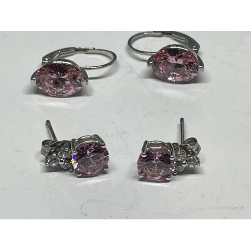 571 - TWO PAIRS OF SILVER AND PINK STONE EARRINGS IN A PRESENTATION BOX