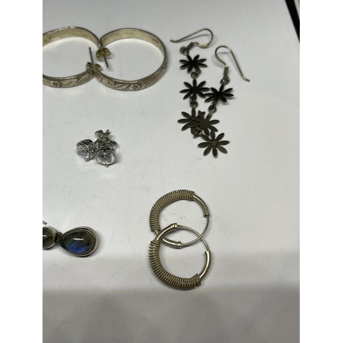 572 - EIGHT PAIRS OF SILVER EARRINGS