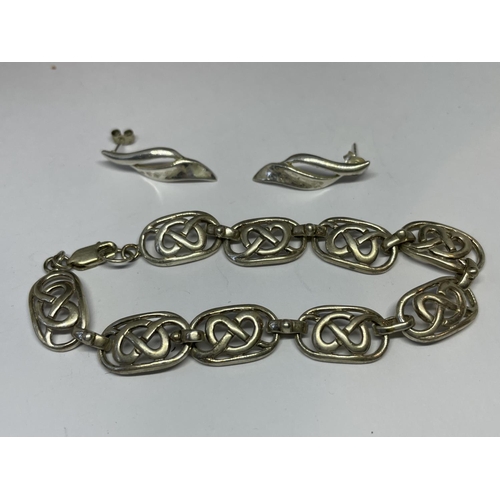 582 - A MARKED SILVER MACINTOSH BRACELET AND EARRINGS WITH A PRESENTATION BOX