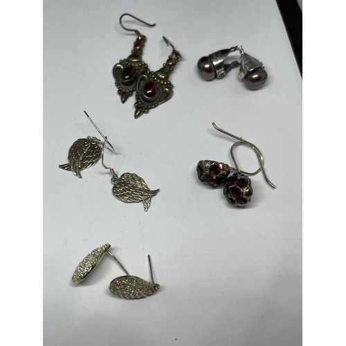 591 - TEN PAIRS OF SILVER EARRINGS