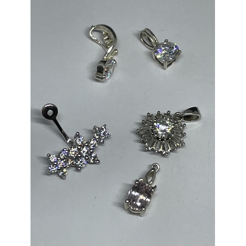 598 - A QUANTITY OF SILVER PENDANTS