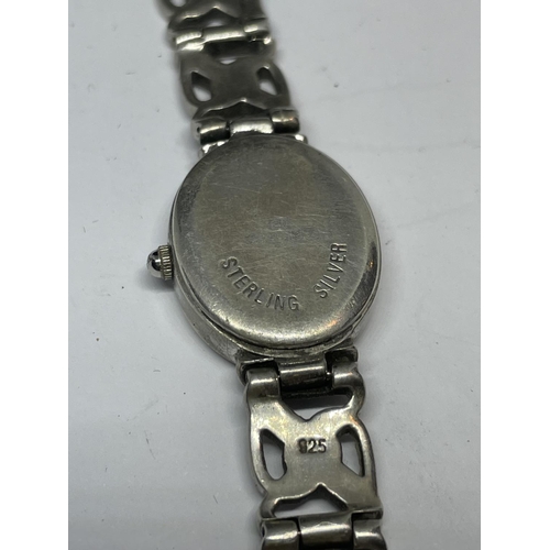 638 - A MARKED SILVER WRIST WATCH SEEN WORKING BUT NO WARRANTY