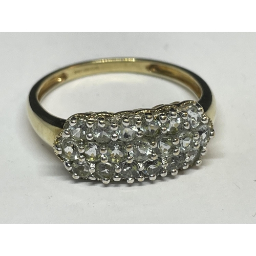 645 - A 9 CARAT GOLD RING WITH NINETEEN CIBIC ZIRCONIA STONES 3.2 GRAMS GROSS WEIGHT SIZE V