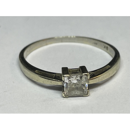 664 - A 9 CARAT GOLD RING WITH A SQUARE SOLITAIRE STONE SIZE M/N