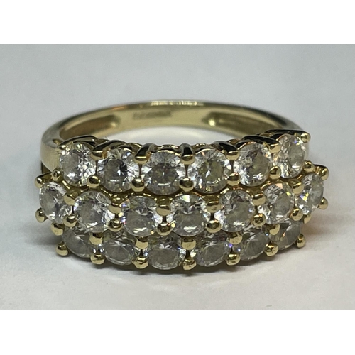 669 - A 14 CARAT GOLD RING WITH NINETEEN CUBIC ZIRCONIA STONES IN A CLUSTER SIZE M