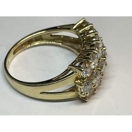 669 - A 14 CARAT GOLD RING WITH NINETEEN CUBIC ZIRCONIA STONES IN A CLUSTER SIZE M