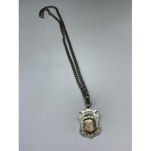 678 - A SILVER CHAIN WITH FOB PENDANT