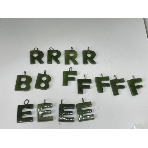 682A - FIFTEEN JADE LETTER PENDANTS TO INCLUDE B,R,F AND E