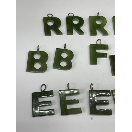 682A - FIFTEEN JADE LETTER PENDANTS TO INCLUDE B,R,F AND E