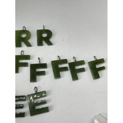 682A - FIFTEEN JADE LETTER PENDANTS TO INCLUDE B,R,F AND E