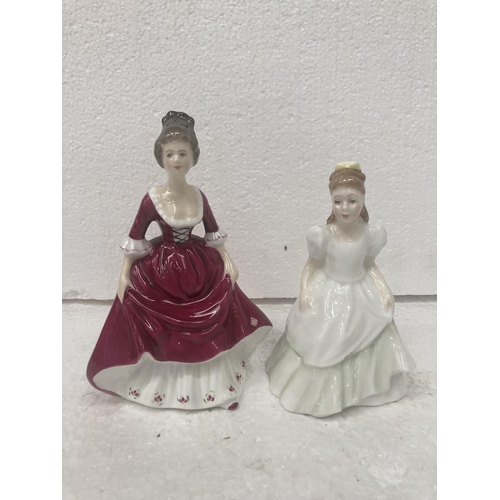 714 - A ROYAL DOULTON SMALL FIGURINE 