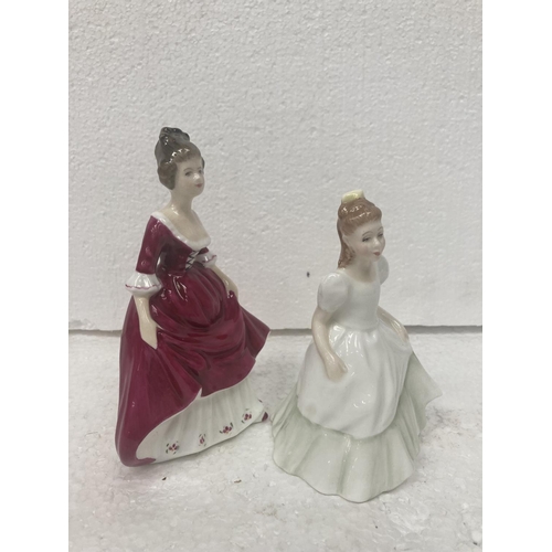 714 - A ROYAL DOULTON SMALL FIGURINE 