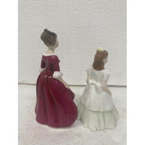 714 - A ROYAL DOULTON SMALL FIGURINE 