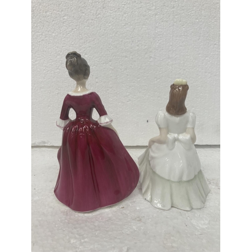 714 - A ROYAL DOULTON SMALL FIGURINE 