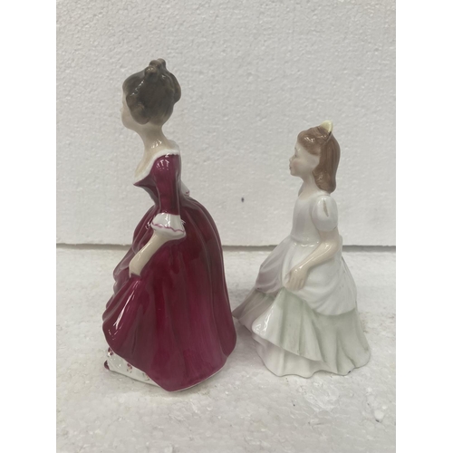 714 - A ROYAL DOULTON SMALL FIGURINE 