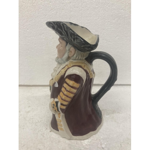 750 - A STAFFORDSHIRE FINE CERAMICS HAND PAINTED TOBY JUG 